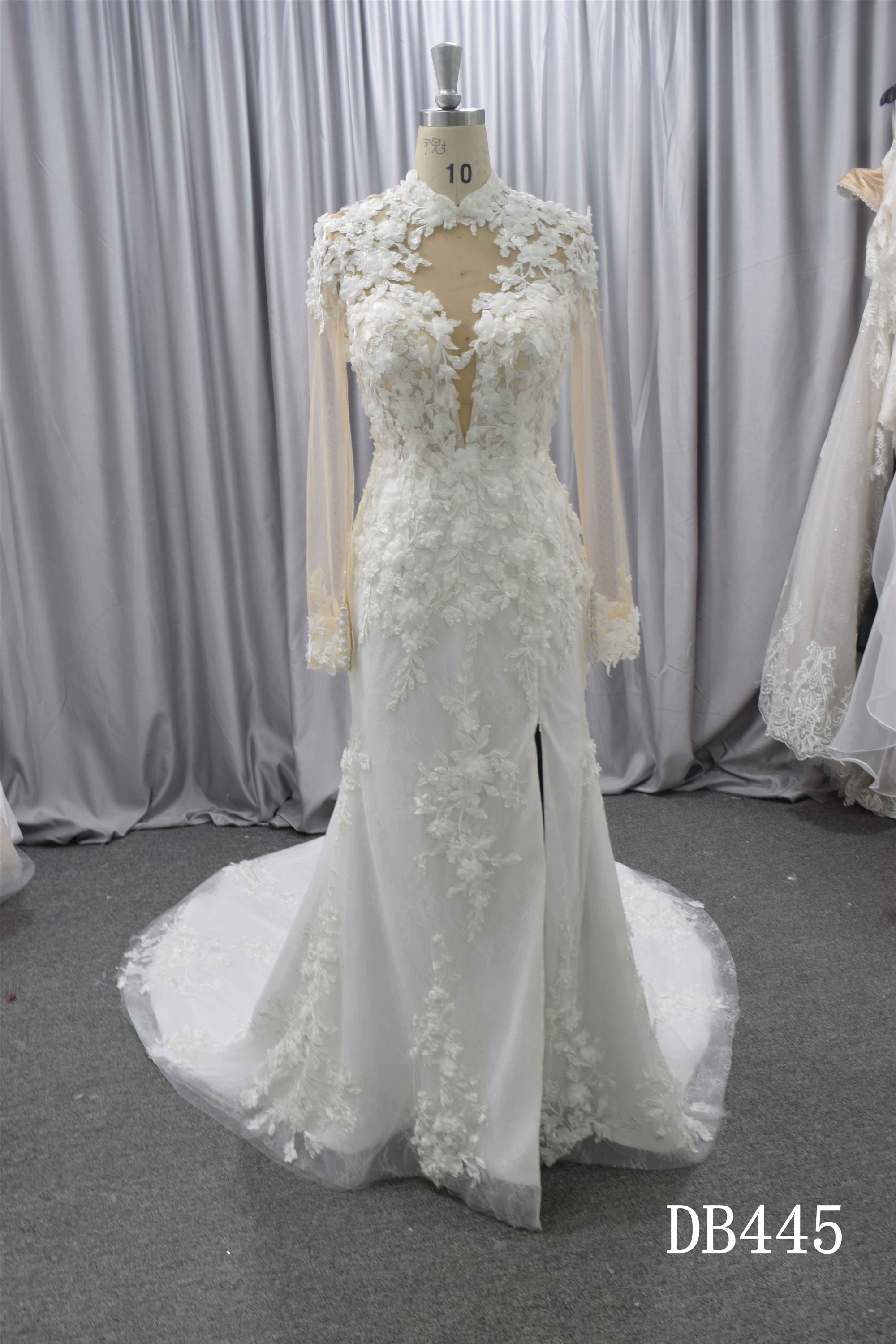 Long sleeves wedding dress with a split in the front of the skirt