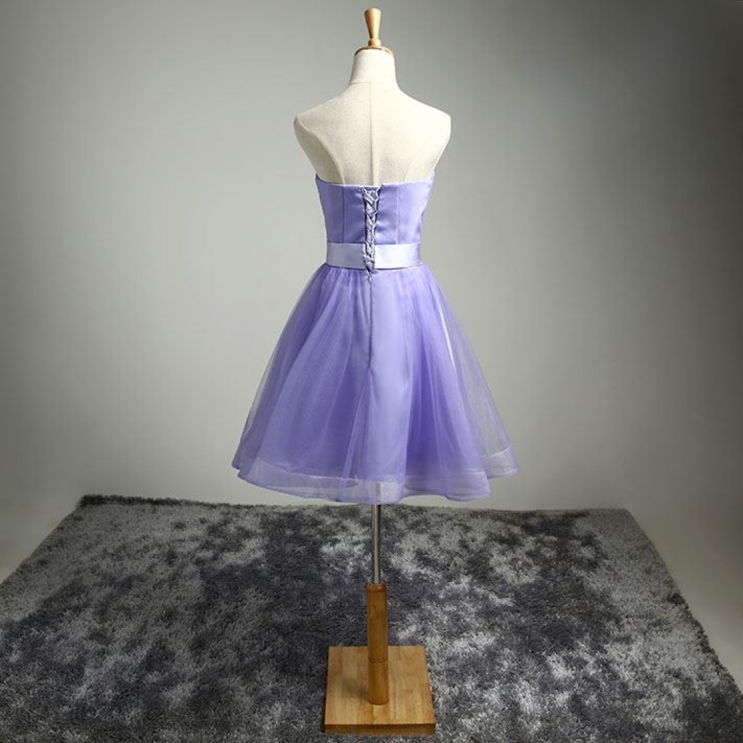 Lovely cocktail dress with beading belt and pleats details